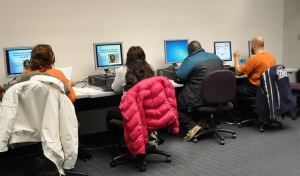 Job seekers using computer in the resource room.